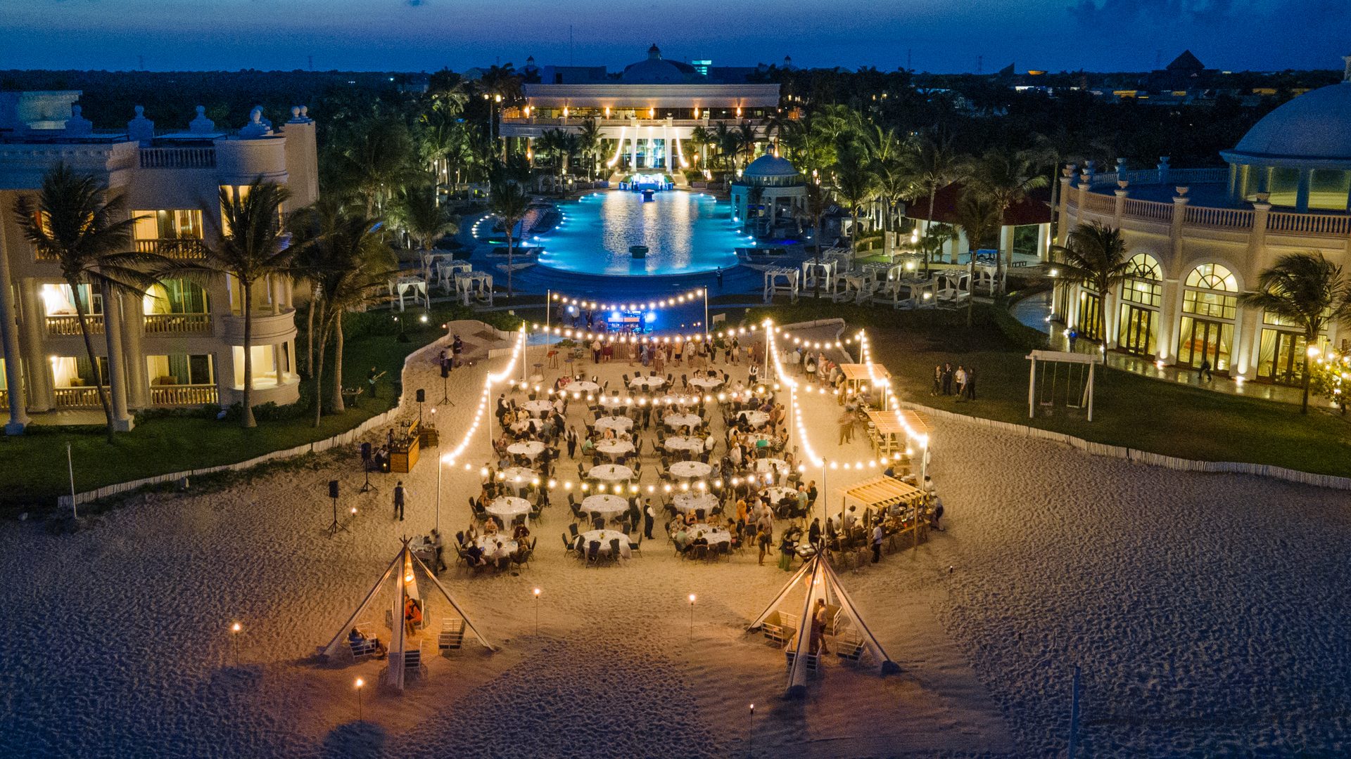 Aerial beach dinner corporate event Iberostar Selection Cancún