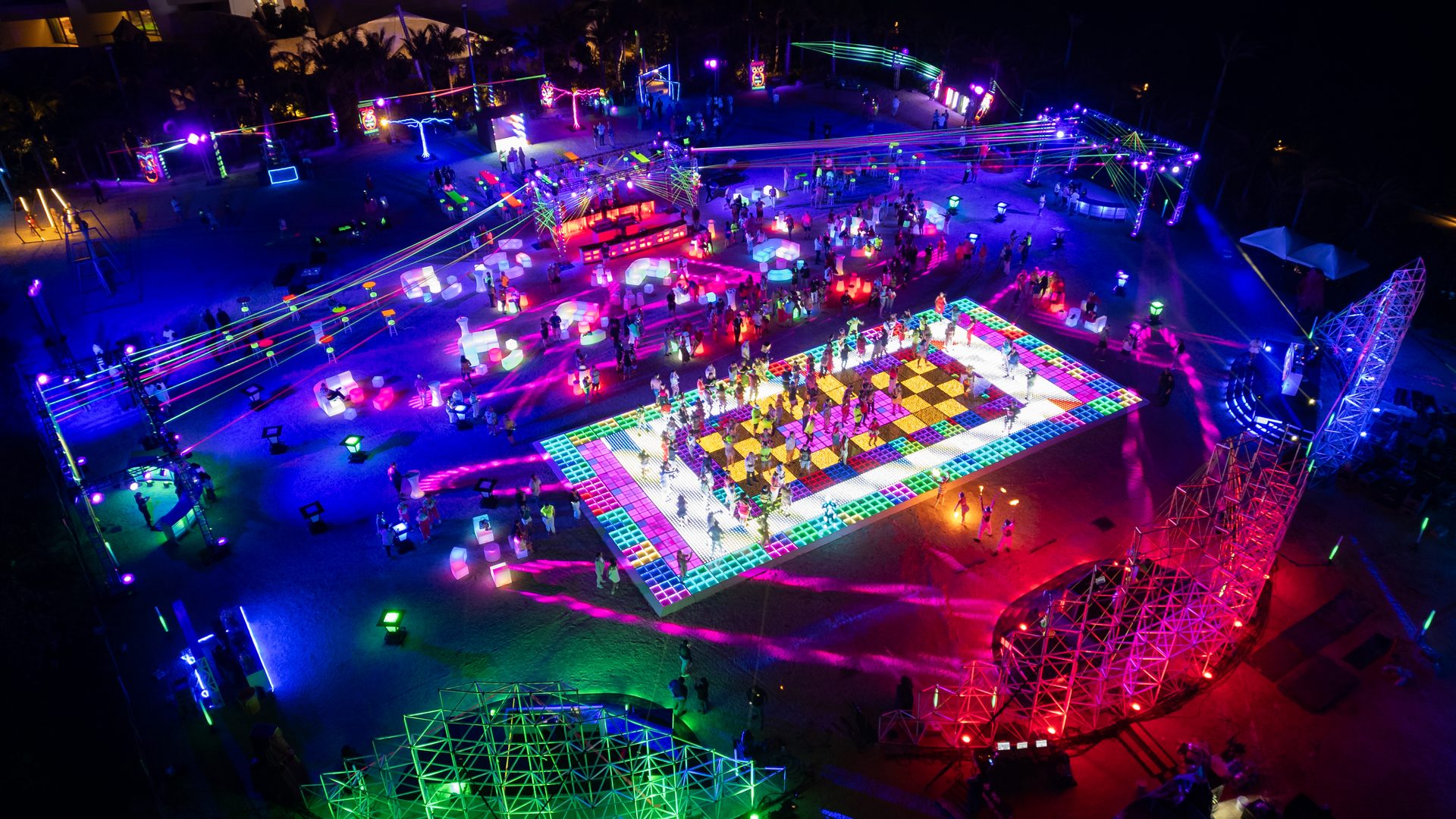 Aerial corporate event neon party Hilton Cancún